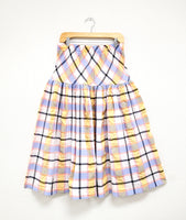 multicolor plaid skirt with a wide elastic waistband and a dropped waist with gathering