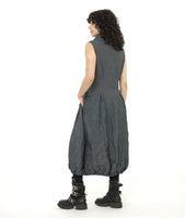 model in a black and grey pinstripe sleeveless dress with a crush texture. dress has an oversized cowl neck, tucks at the front and back waist, and an elastic gathering at the bottom hem creating a tulip shaped skirt