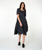 model in a black and grey pinstriped dress with contrasting panels