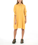 model in a yellow shirt dress