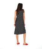 model in a long black tank dress with white polkadots