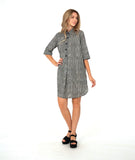 model in a black and white striped shirt dress