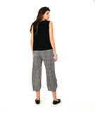 model in a black tank top with a black and white stripe wide leg pant with a tapered ankle