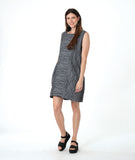 model in a grey sleeveless shift dress with a squared neckline and princess seams and gathered pockets at the hips
