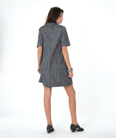 model in a grey pullover dress with an open flat collar and a short sleeve