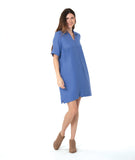 model in a periwinkle pullover dress with an open, flat collar and short sleeves