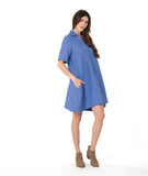 model in a periwinkle pullover dress with an open, flat collar and short sleeves