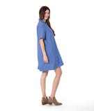 model in a periwinkle pullover dress with an open, flat collar and short sleeves