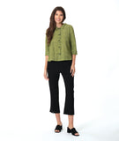 model in a slim leg black pant with a black and green striped button down blouse with 3/4 sleeves